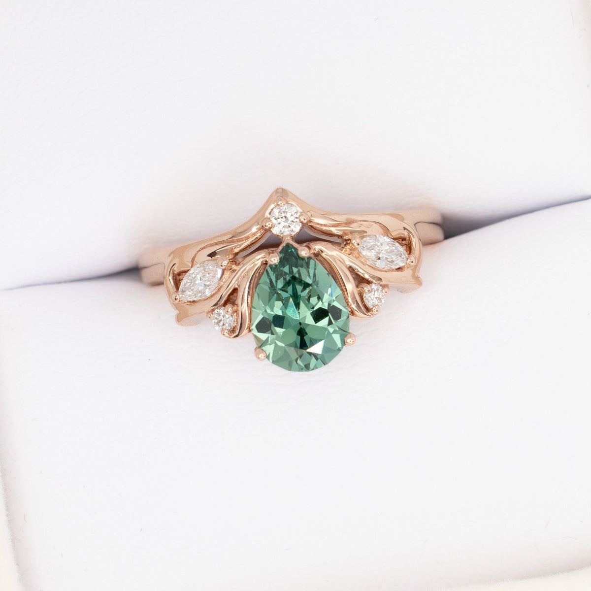 adira nature inspired ring in rose gold with green lab sapphire pear