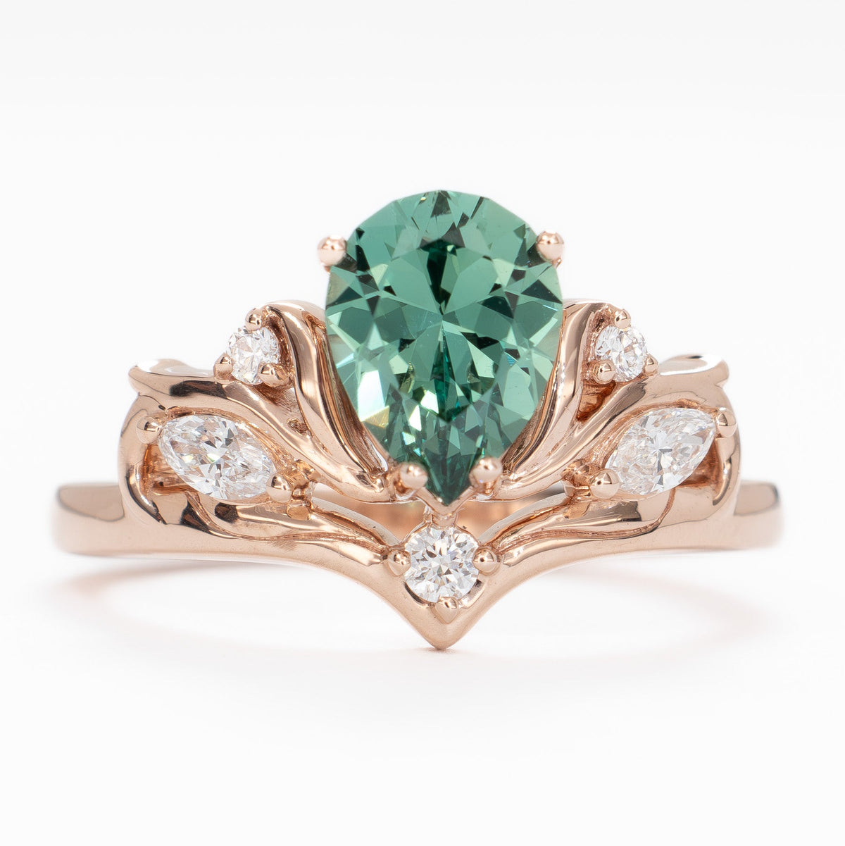 adira nature inspired ring in rose gold with green lab sapphire pear