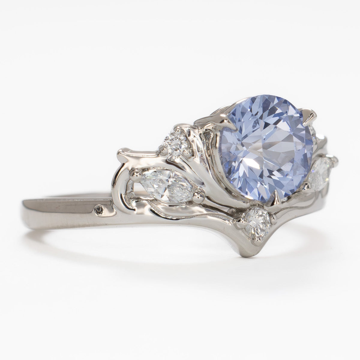 adira nature inspired ring in white gold with round light blue lab sapphire