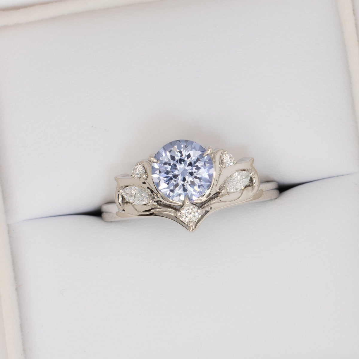 adira nature inspired ring in white gold with round light blue lab sapphire