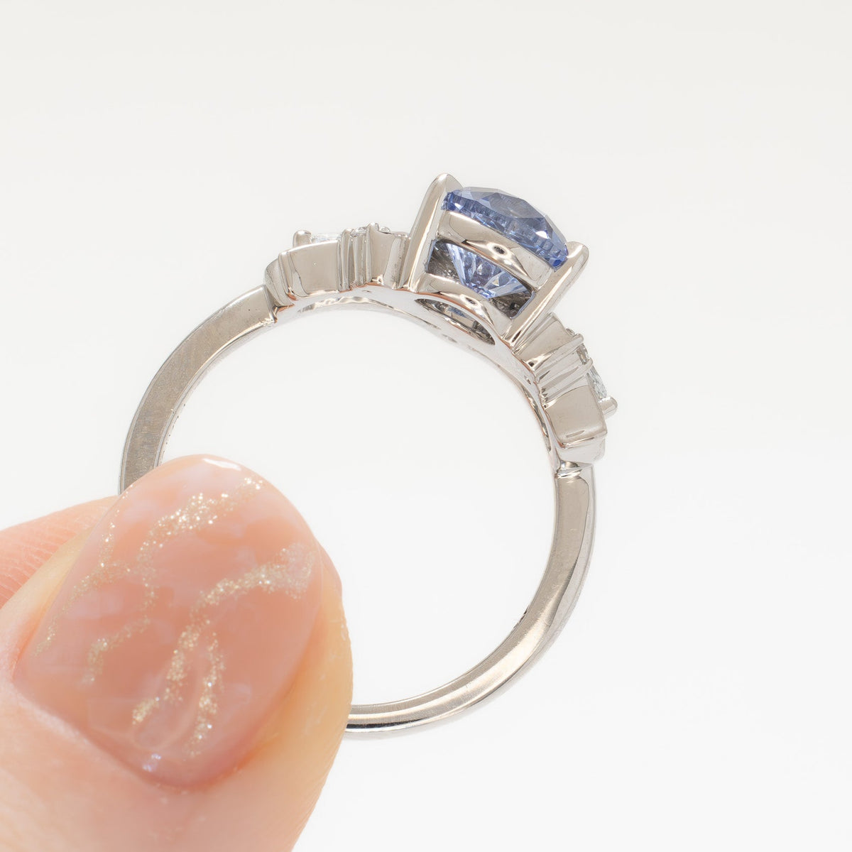 adira nature inspired ring in white gold with round light blue lab sapphire