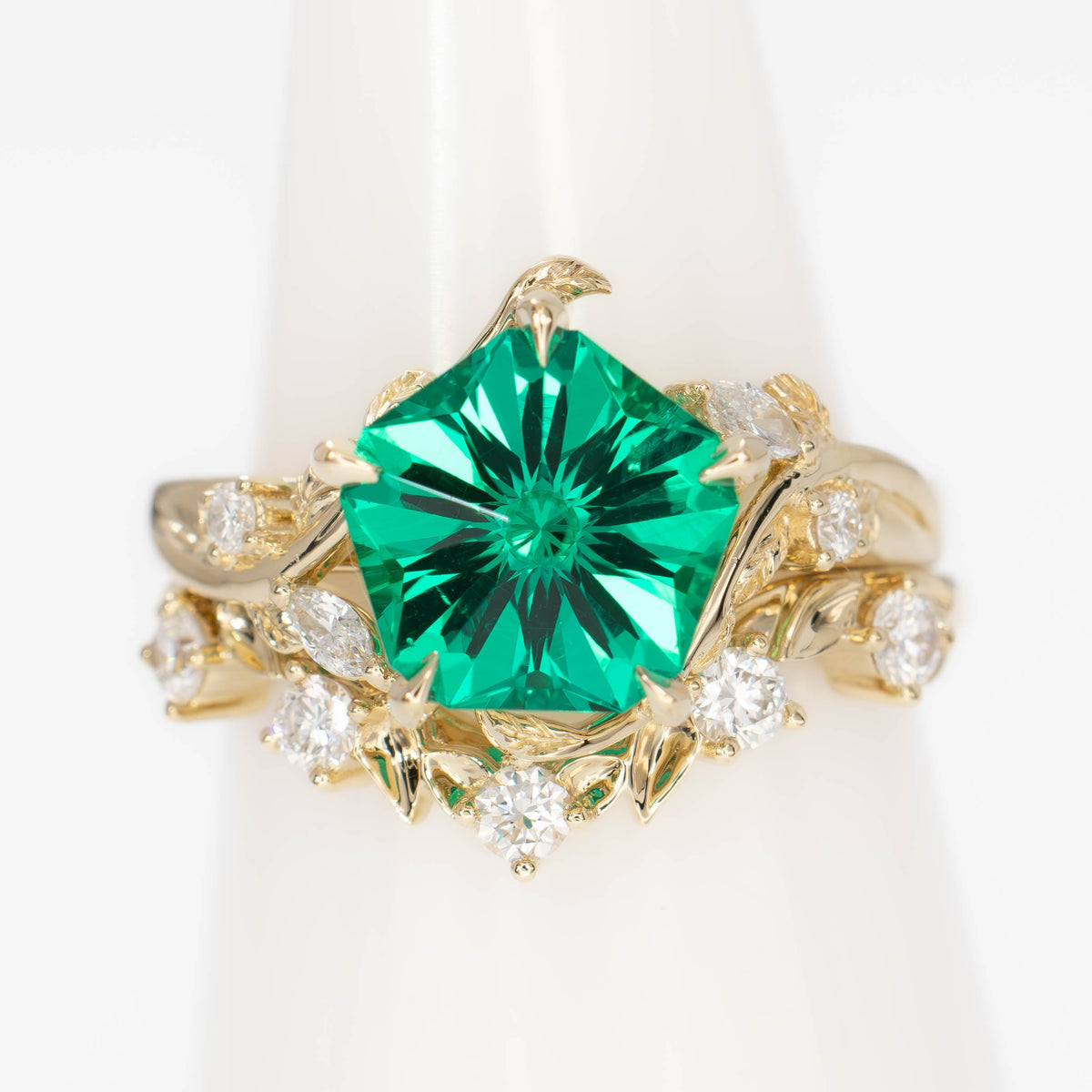 airam and anjelica wedding set in yellow gold with hanami flower lab emerald