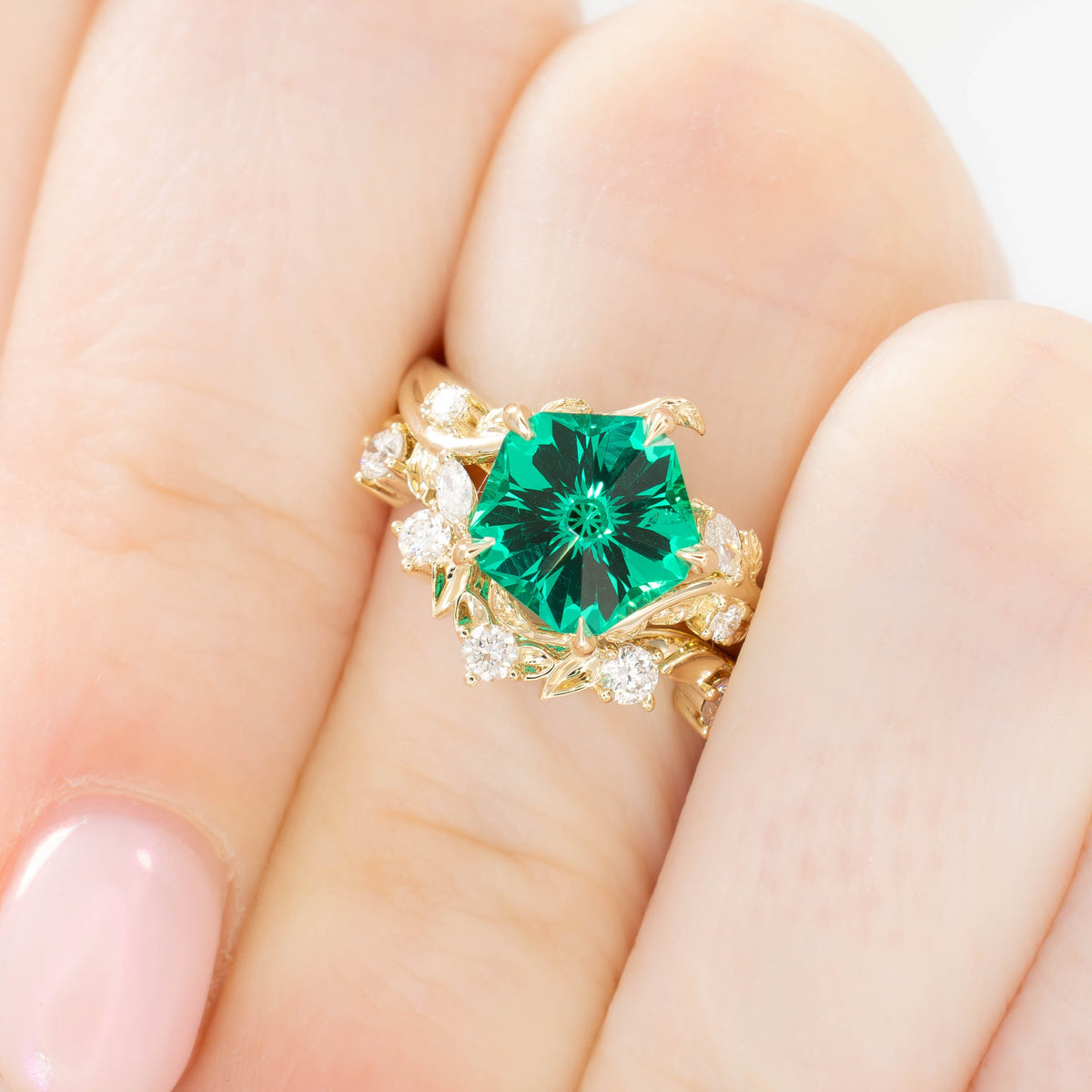 airam and anjelica wedding set in yellow gold with hanami flower lab emerald