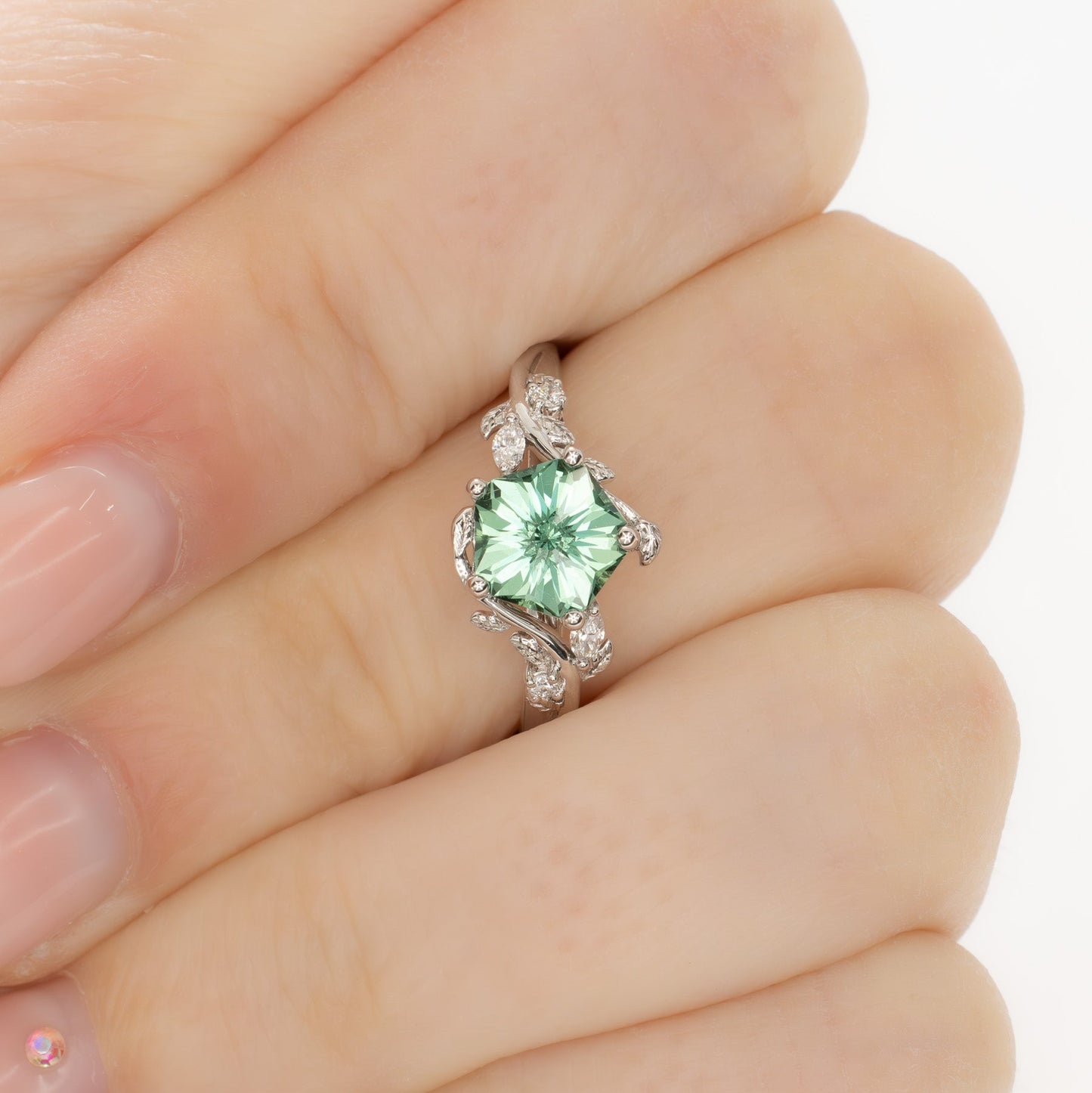 airam nature inspired engagement ring with green hanami lab sapphire