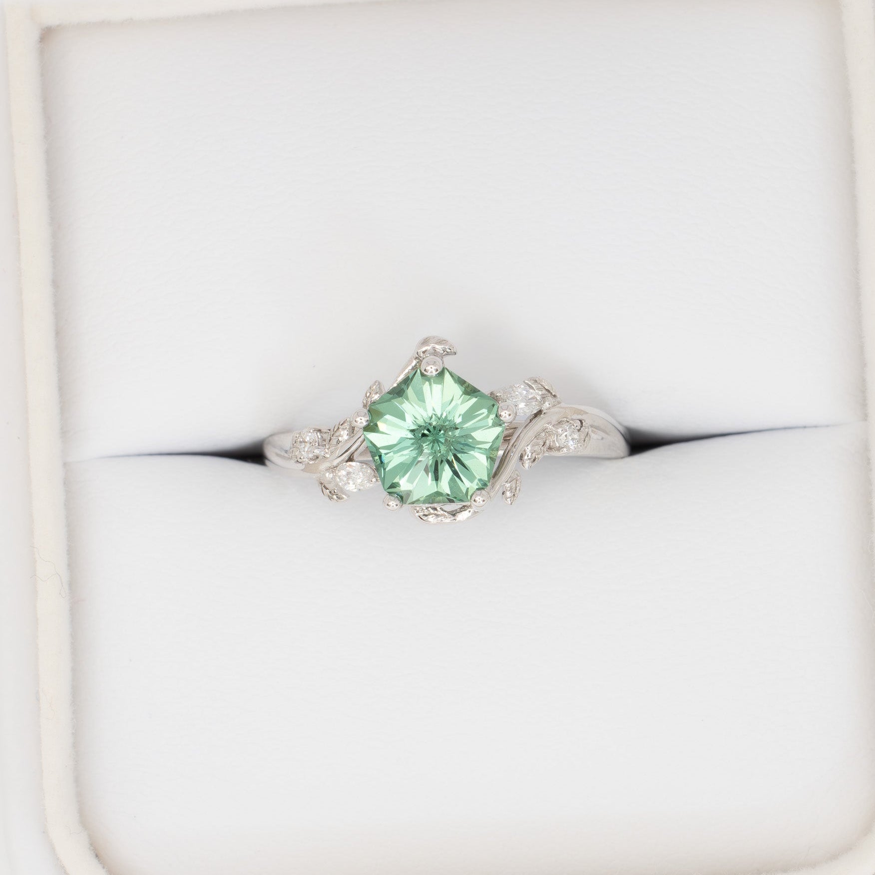 airam nature inspired engagement ring with green hanami lab sapphire