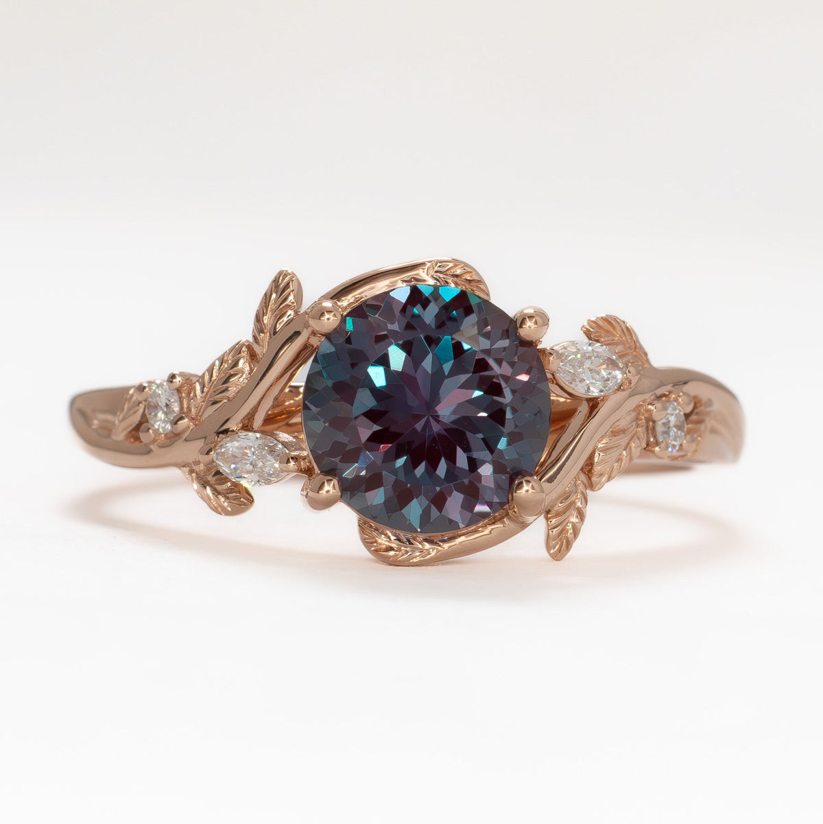 airam nature inspired ring in rose gold with portuguese round lab alexandrite