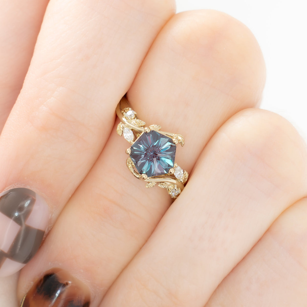 airam nature inspired ring in yellow gold with hanami flower lab alexandrite