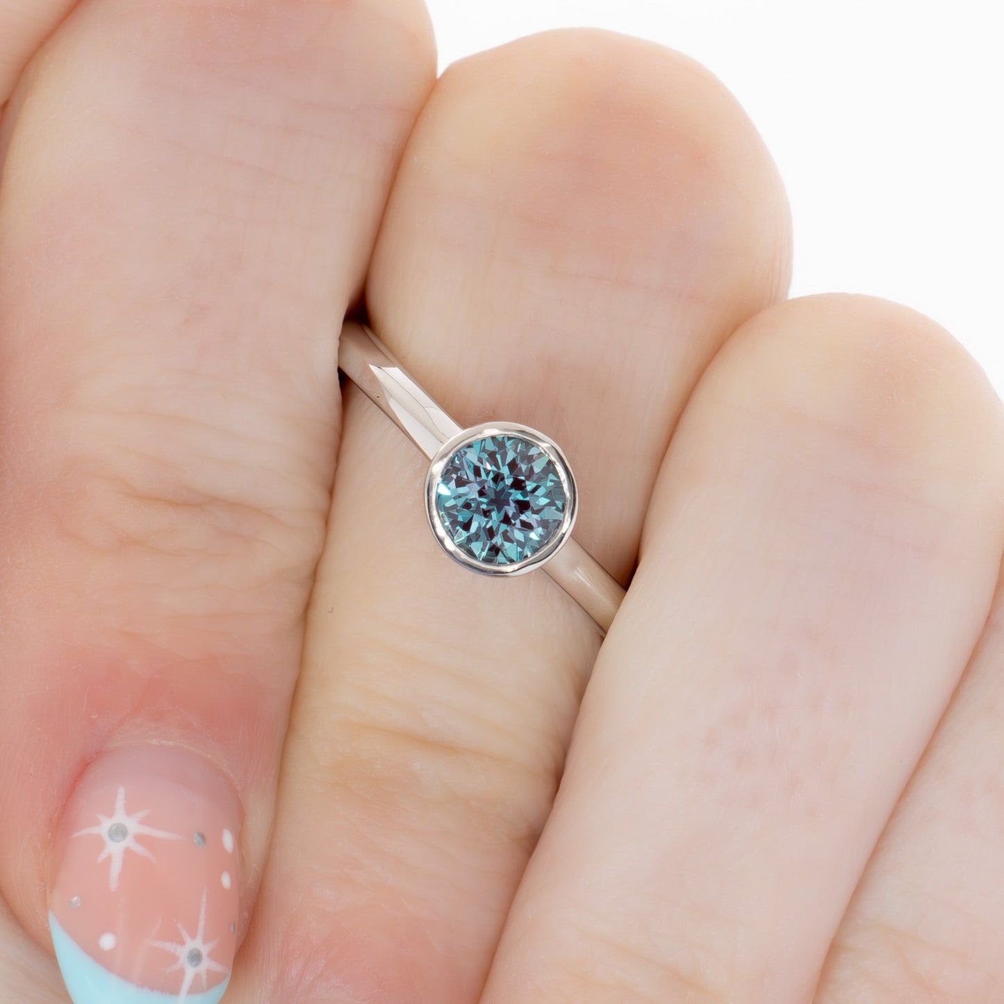 alexandra bezel set solitaire with round lab alexandrite