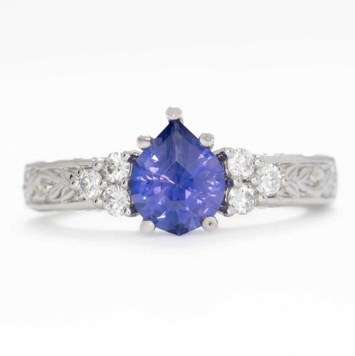alice nature inspired engagement ring in white gold with purple natural sapphire pear