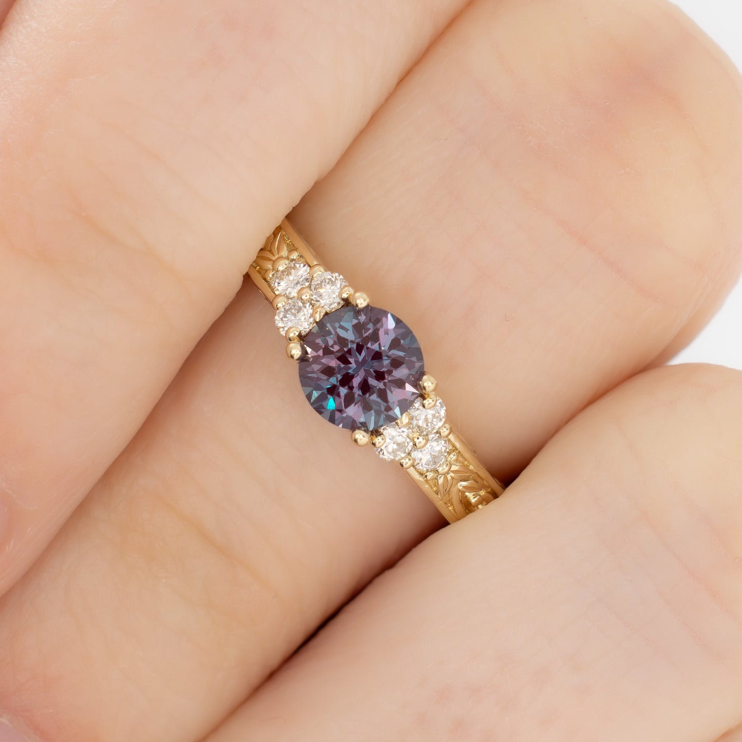 alice nature inspired ring in yellow gold with round lab alexandrite