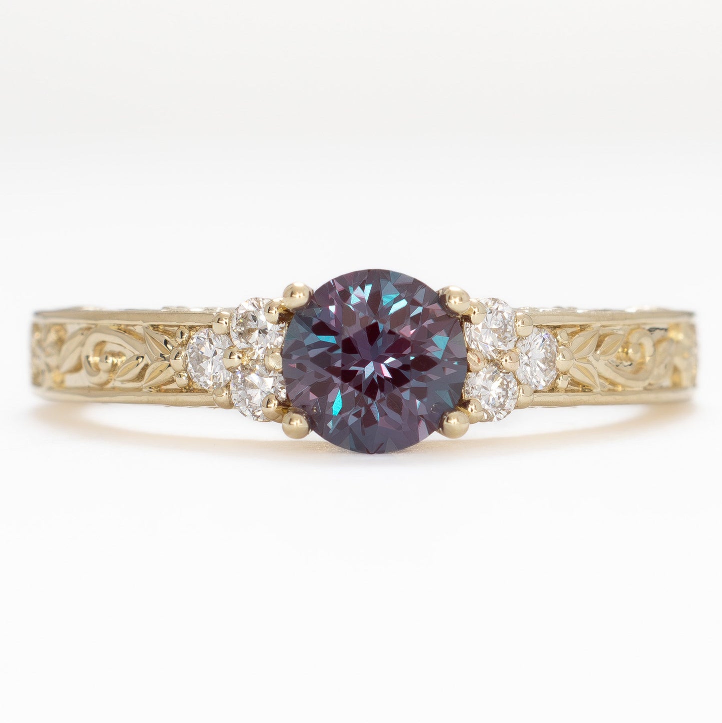 alice nature inspired ring in yellow gold with round lab alexandrite