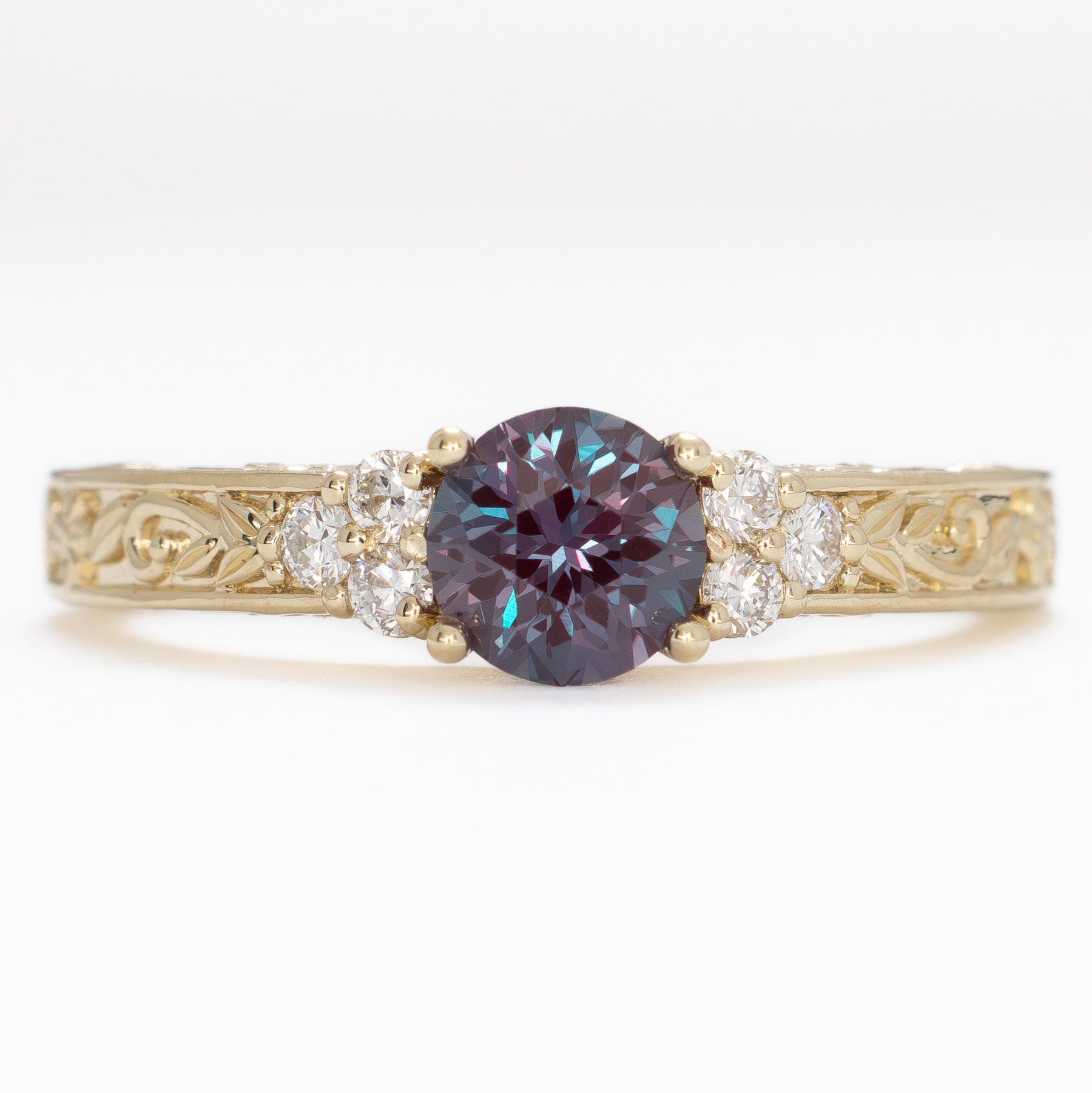 alice nature inspired ring in yellow gold with round lab alexandrite