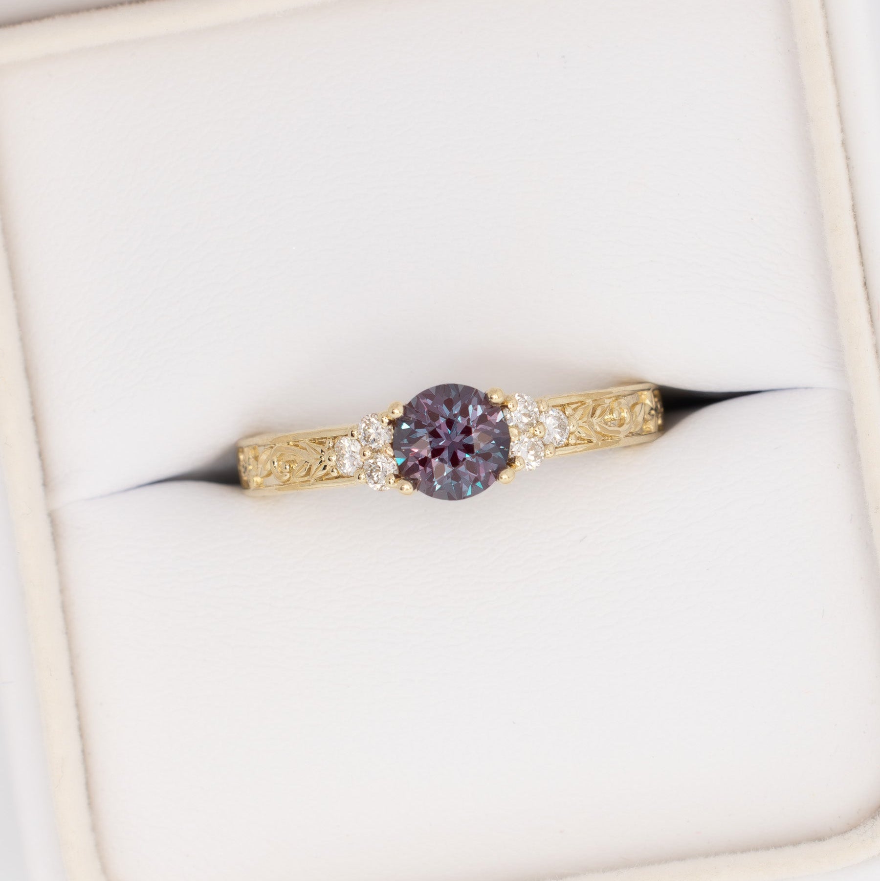 alice nature inspired ring in yellow gold with round lab alexandrite
