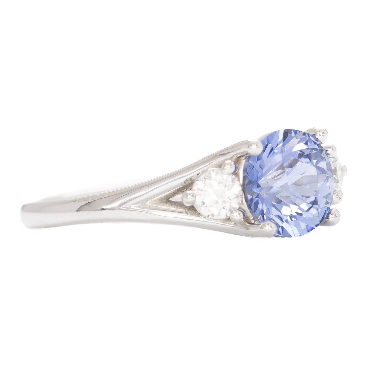 anastasia three stone ring in white gold with round periwinkle blue lab sapphire