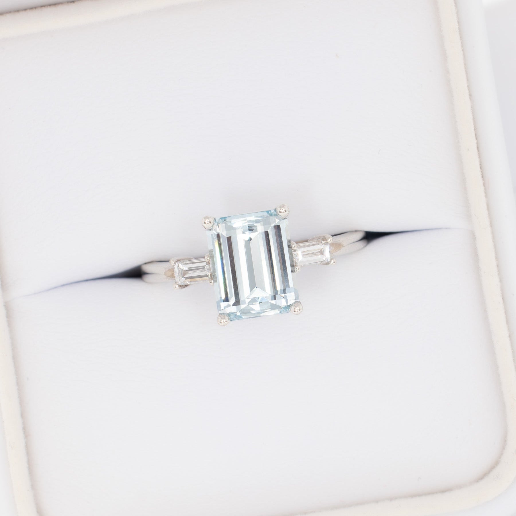 annie three stone ring with step cut blue lab sapphire