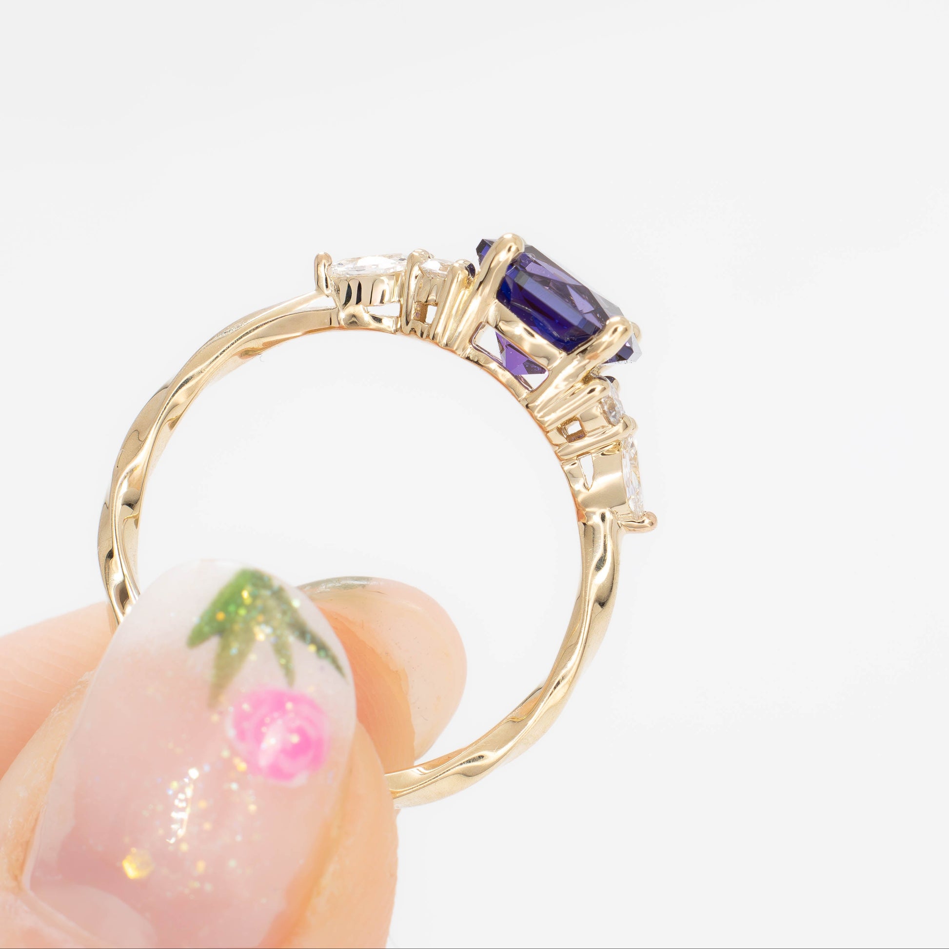 ardene engagement ring with purple lab sapphire in yellow gold