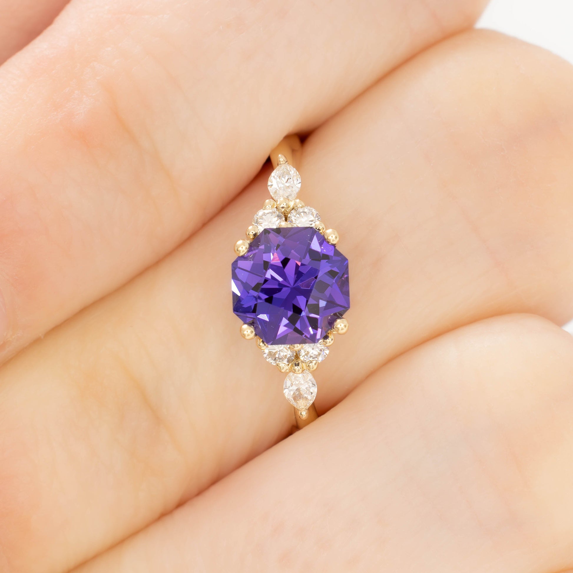 ardene engagement ring with purple lab sapphire in yellow gold