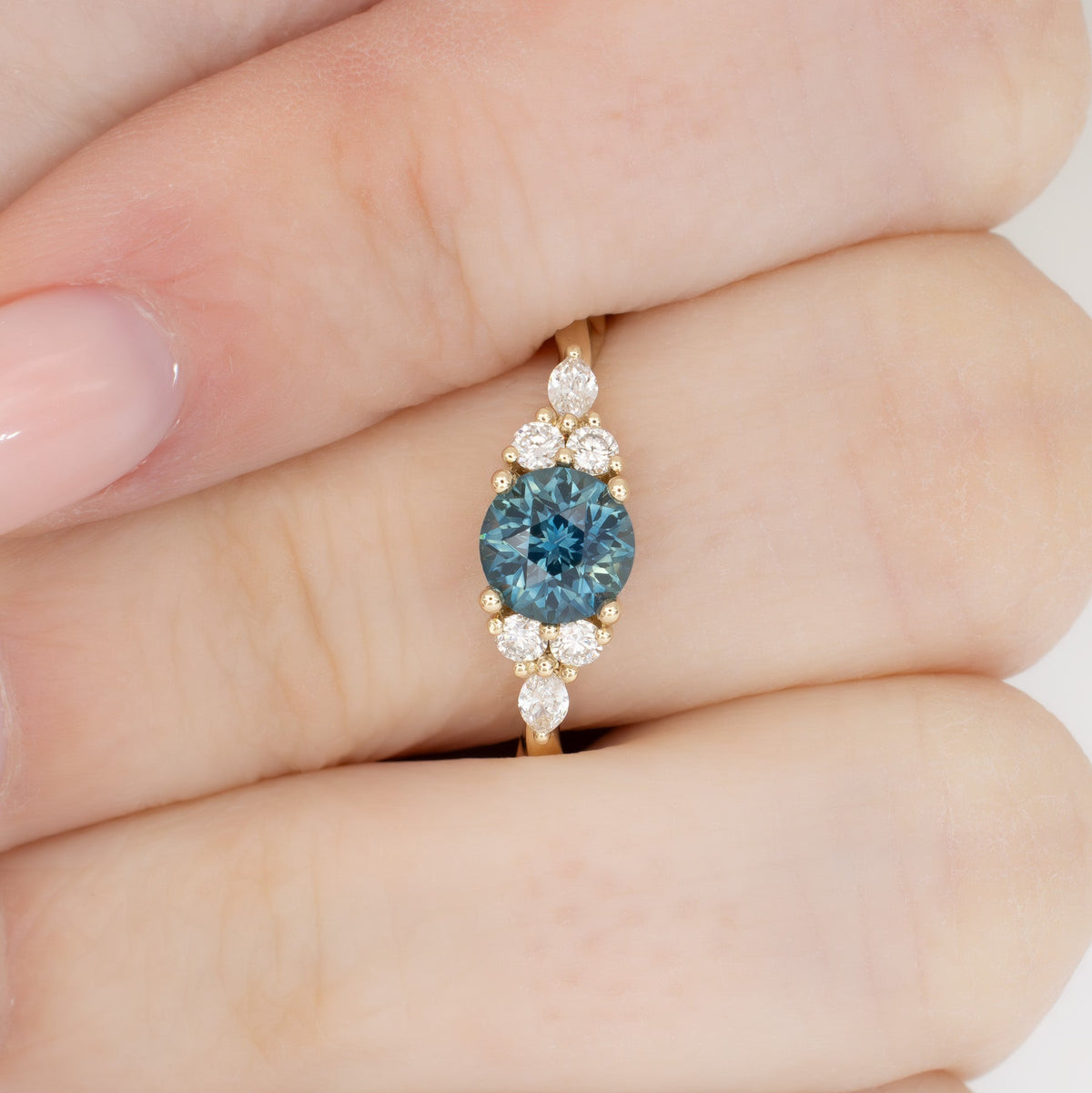 ardene ring in yellow gold with round montana sapphire