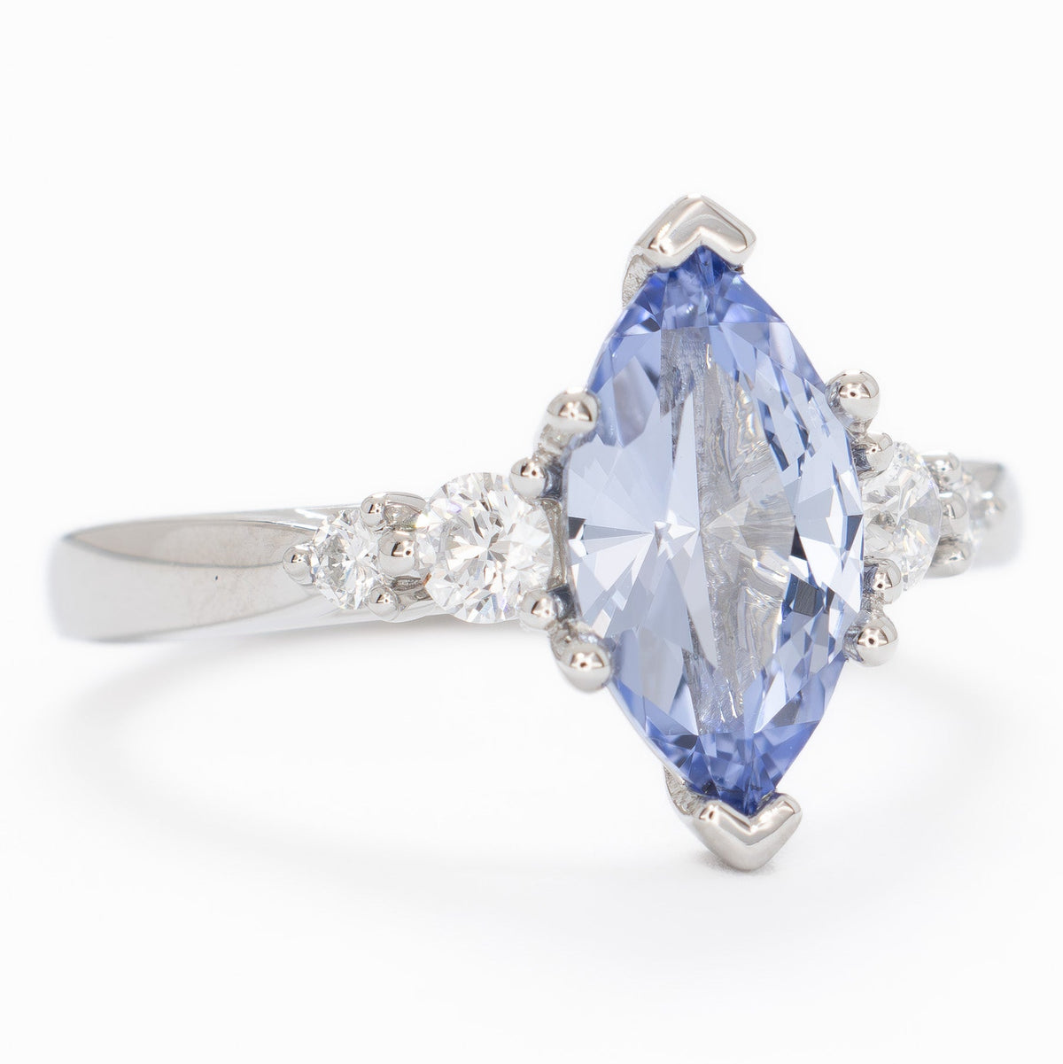 ariel accented ring in white gold with light blue lab sapphire marquise