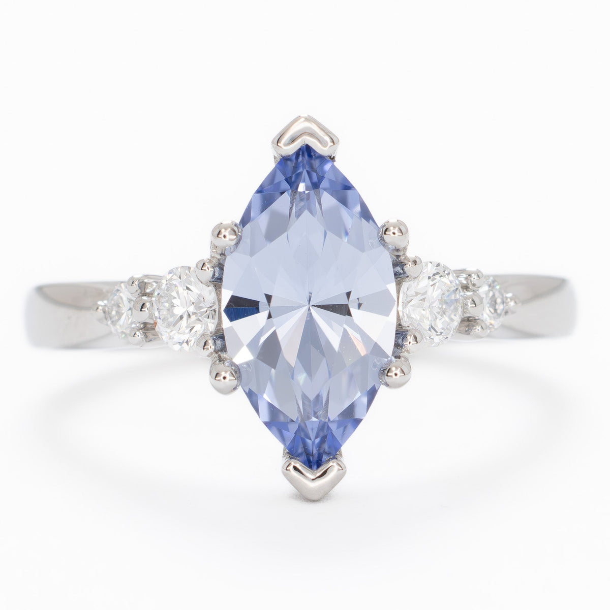 ariel accented ring in white gold with light blue lab sapphire marquise