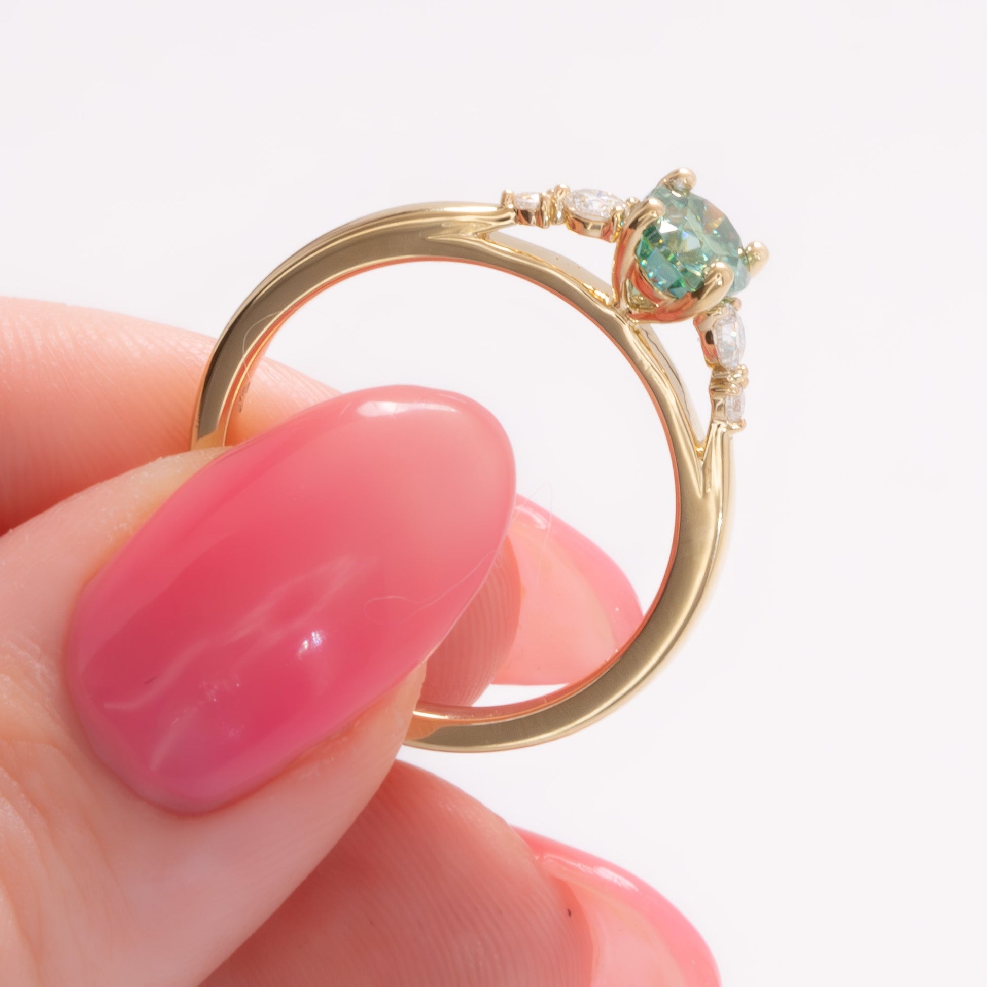 ariel wedding set with oval green moissanite