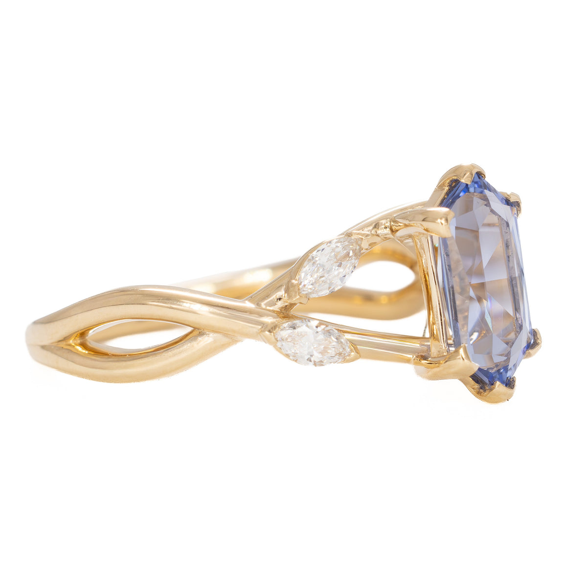 avani nature inspired ring in yellow gold with periwinkle blue lab sapphire dutch marquise