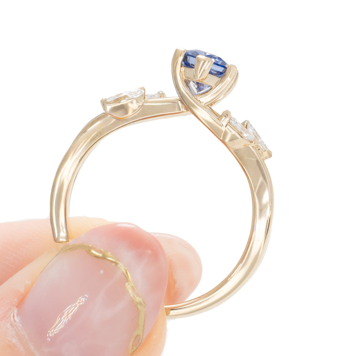 avani nature inspired ring in yellow gold with periwinkle blue lab sapphire dutch marquise