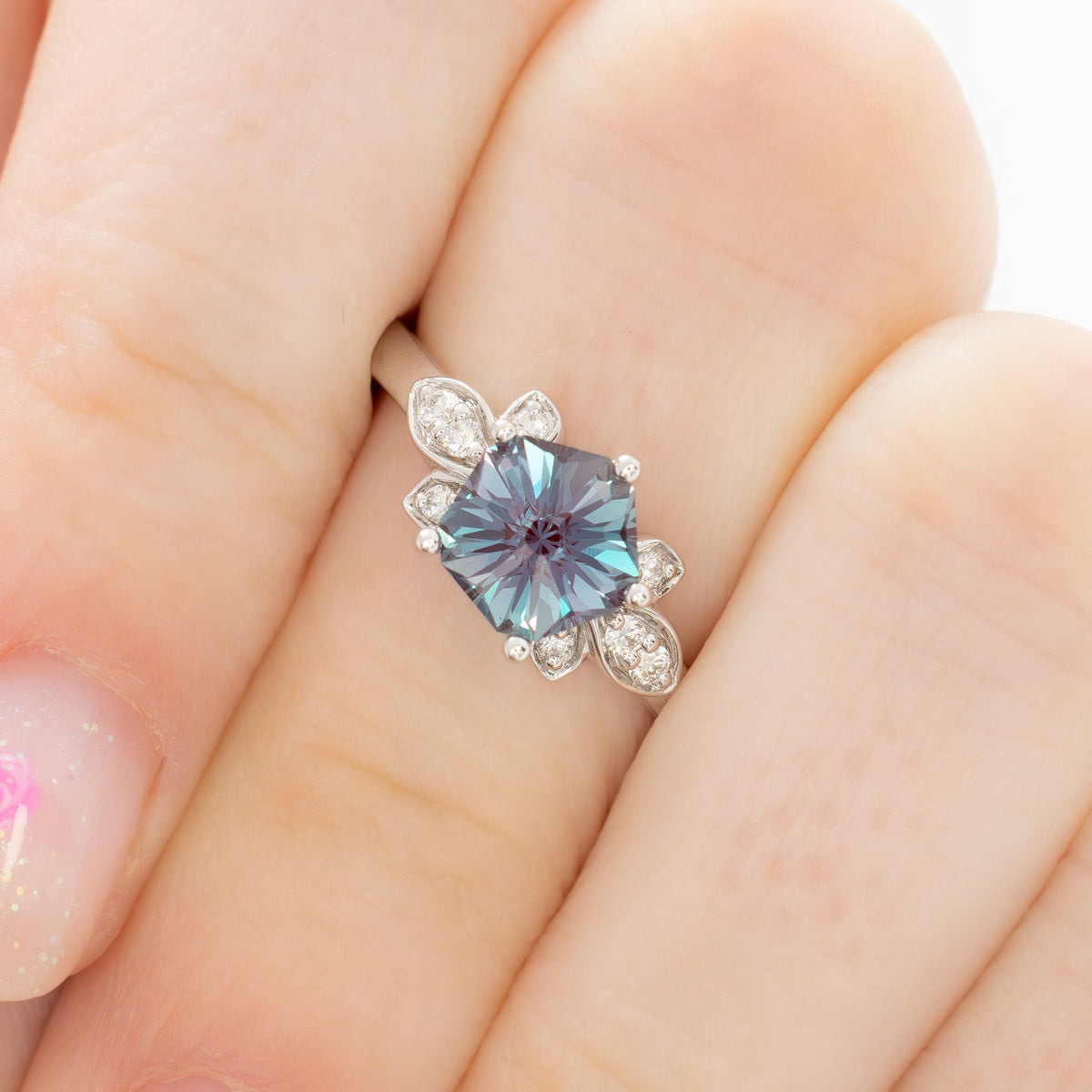 azalea nature inspired engagement ring in white gold with hanami flower lab alexandrite