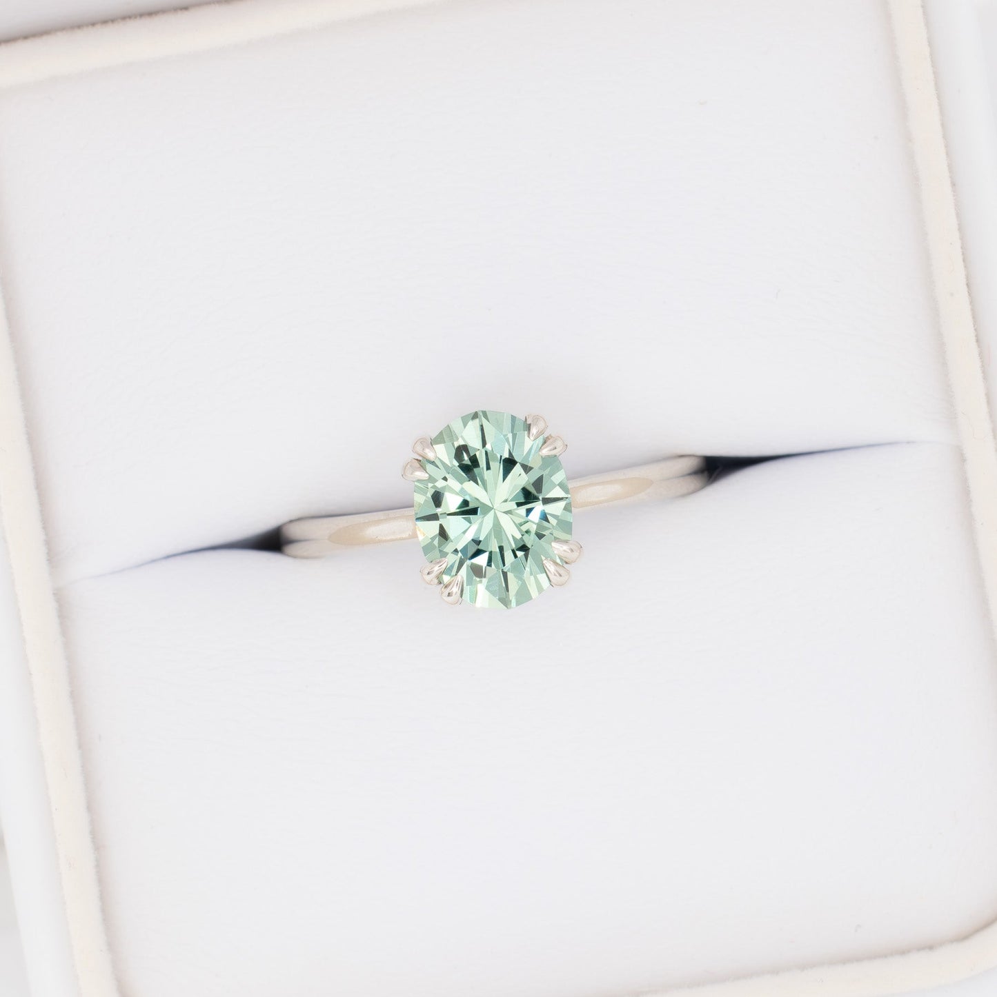 bailey solitaire ring with oval green lab sapphire