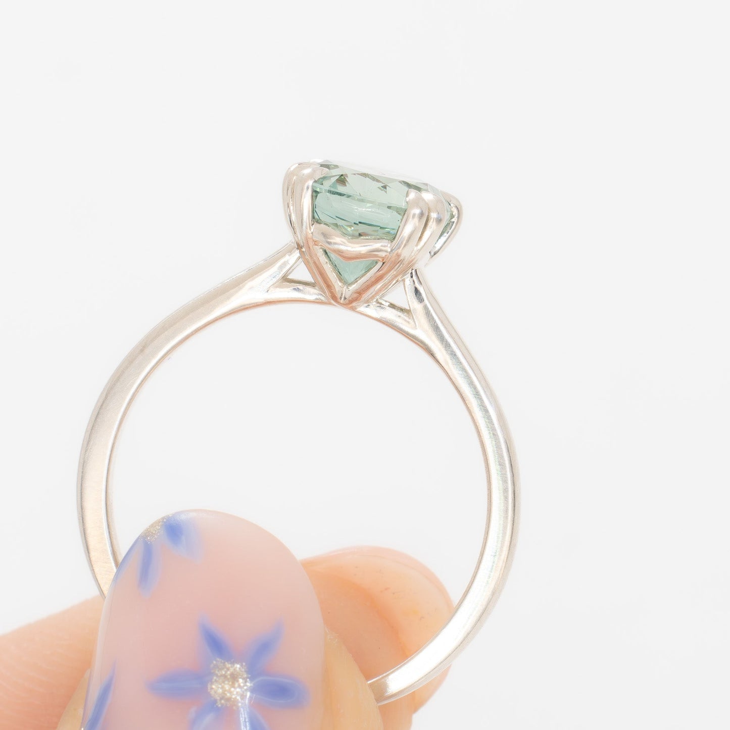 bailey solitaire ring with oval green lab sapphire