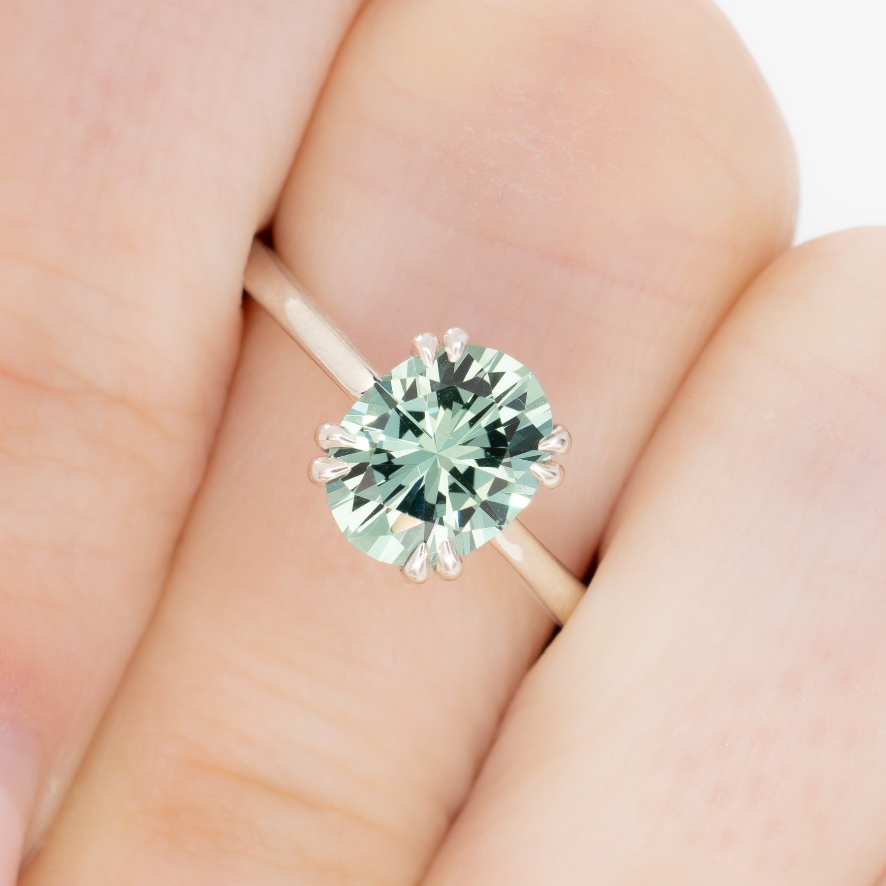 bailey solitaire ring with oval green lab sapphire