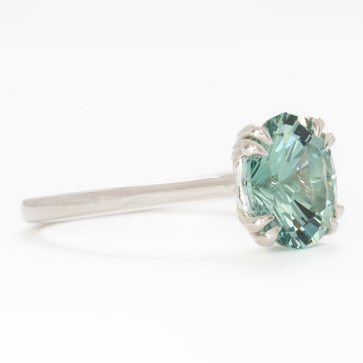 bailey solitaire ring with oval green lab sapphire