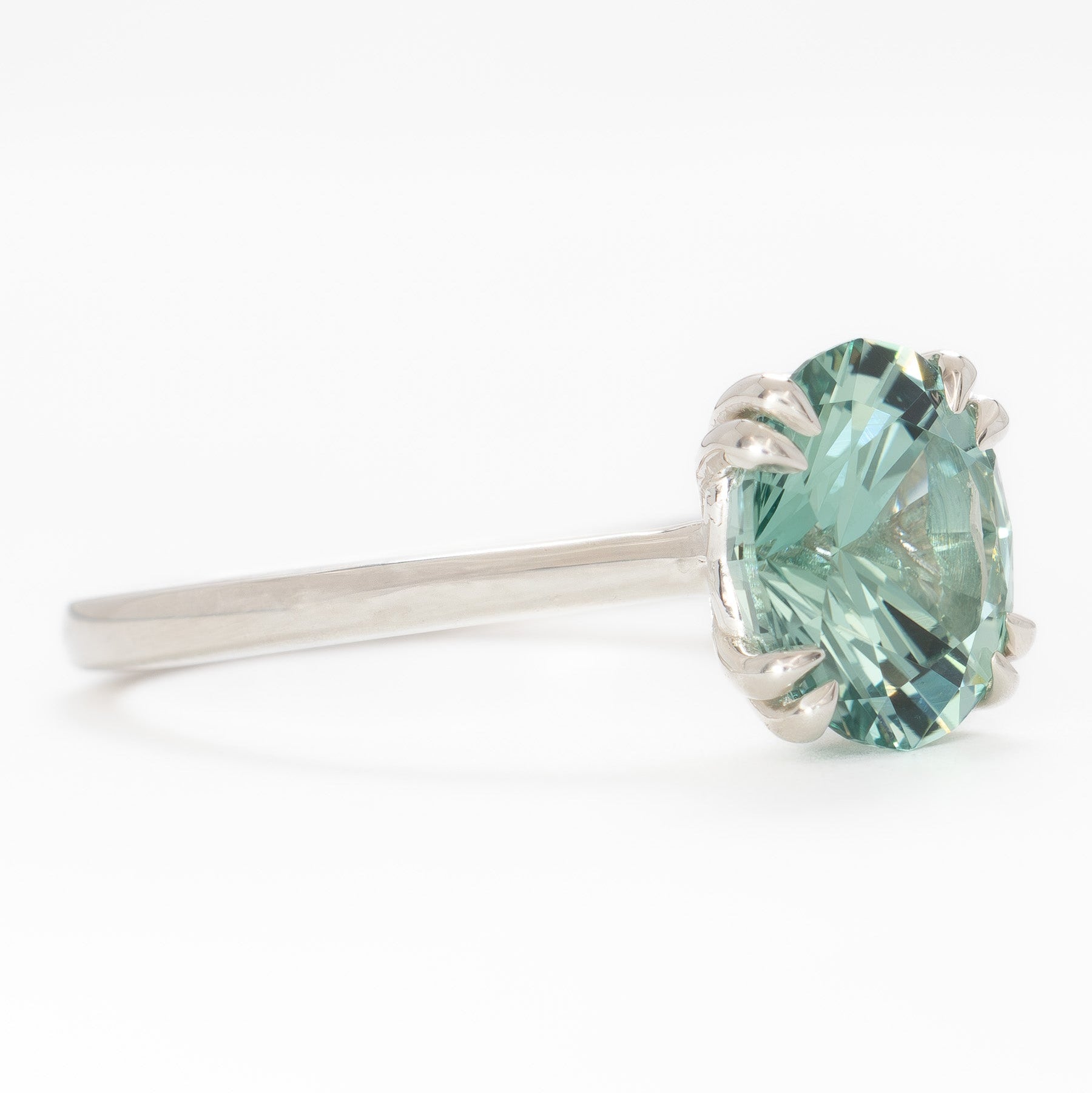 bailey solitaire ring with oval green lab sapphire