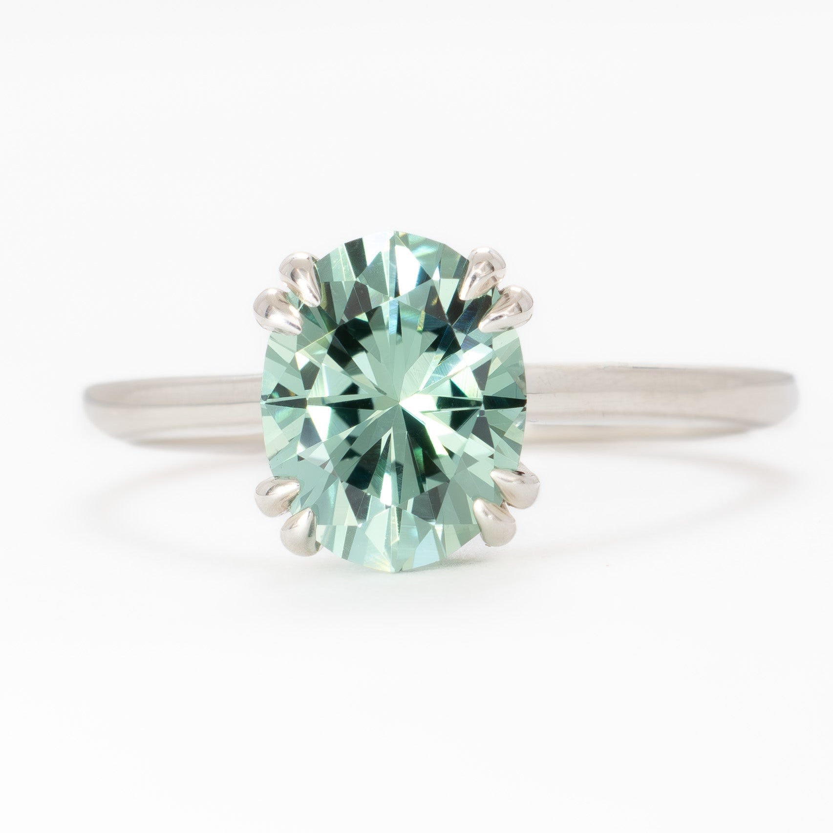 bailey solitaire ring with oval green lab sapphire