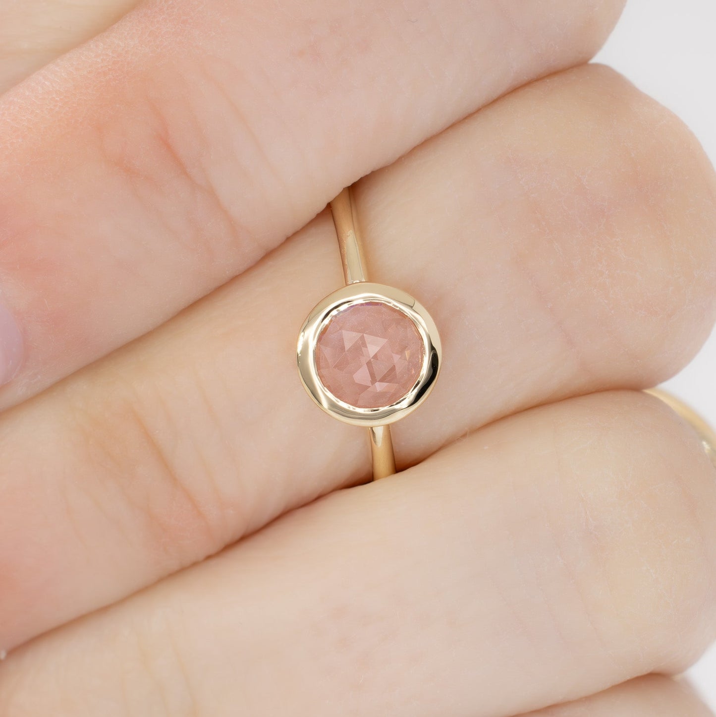bezel set solitaire with rose cut pink lab sapphire
