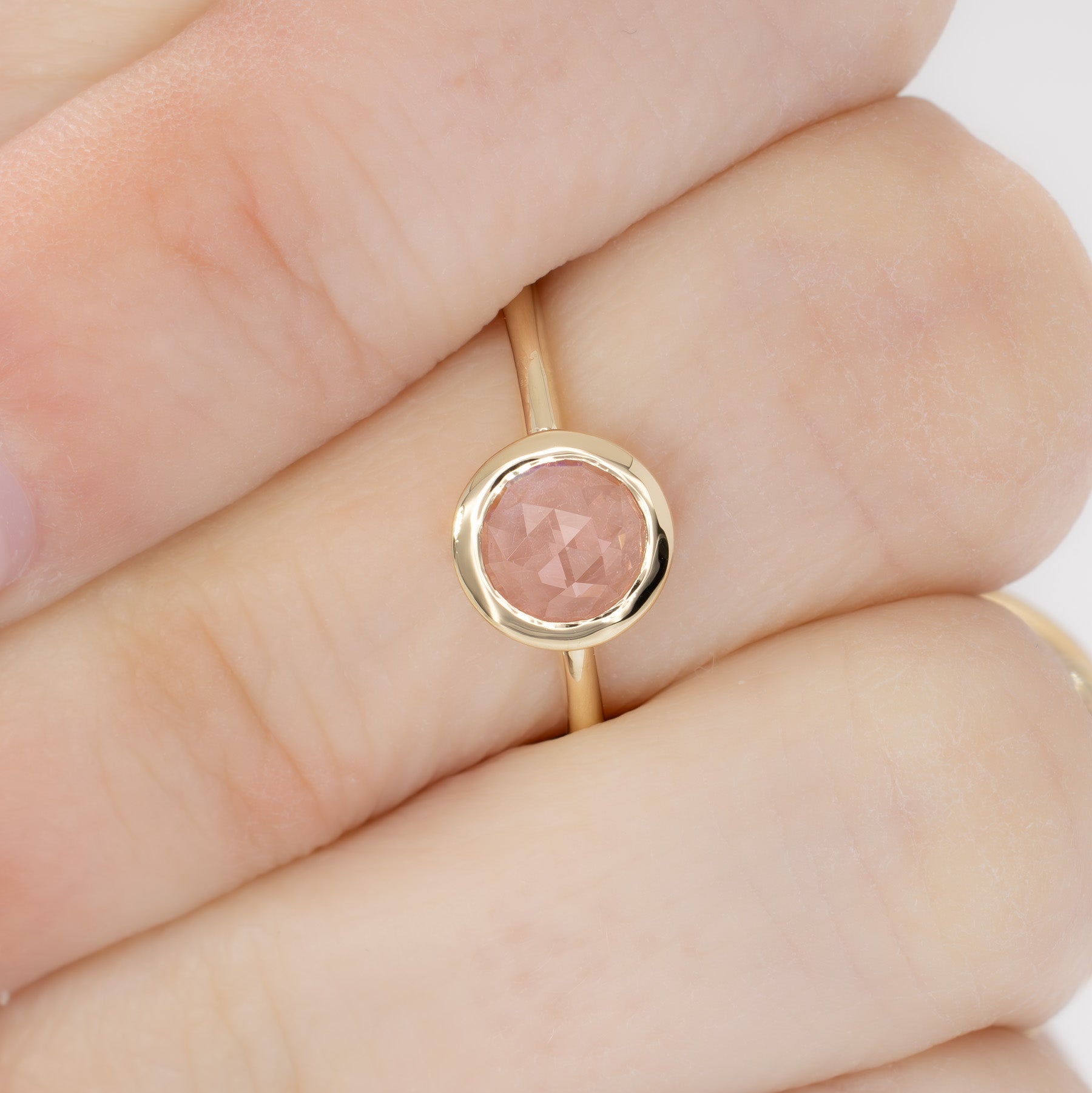 bezel set solitaire with rose cut pink lab sapphire