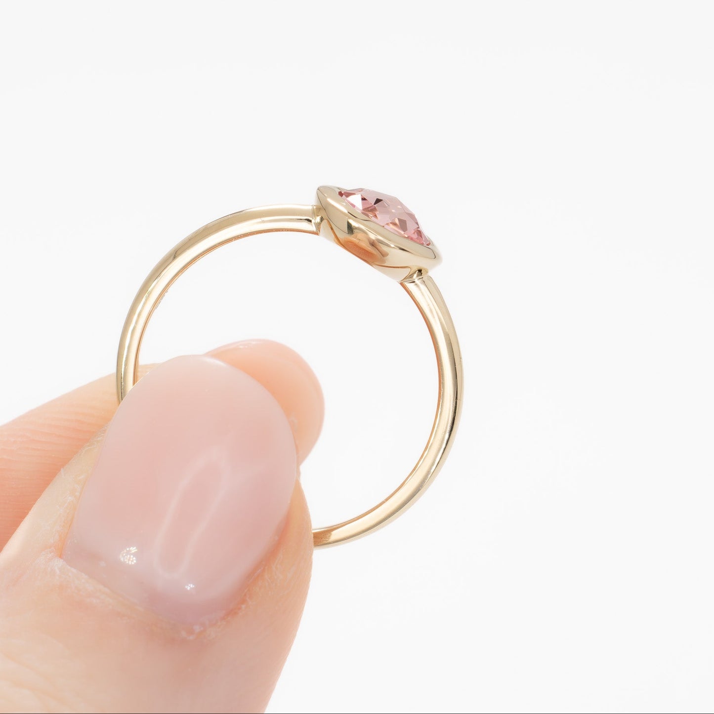 bezel set solitaire with rose cut pink lab sapphire