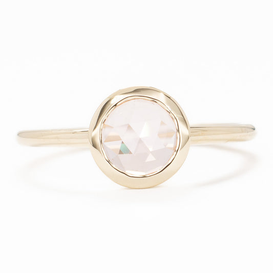 bezel set solitaire with rose cut pink lab sapphire