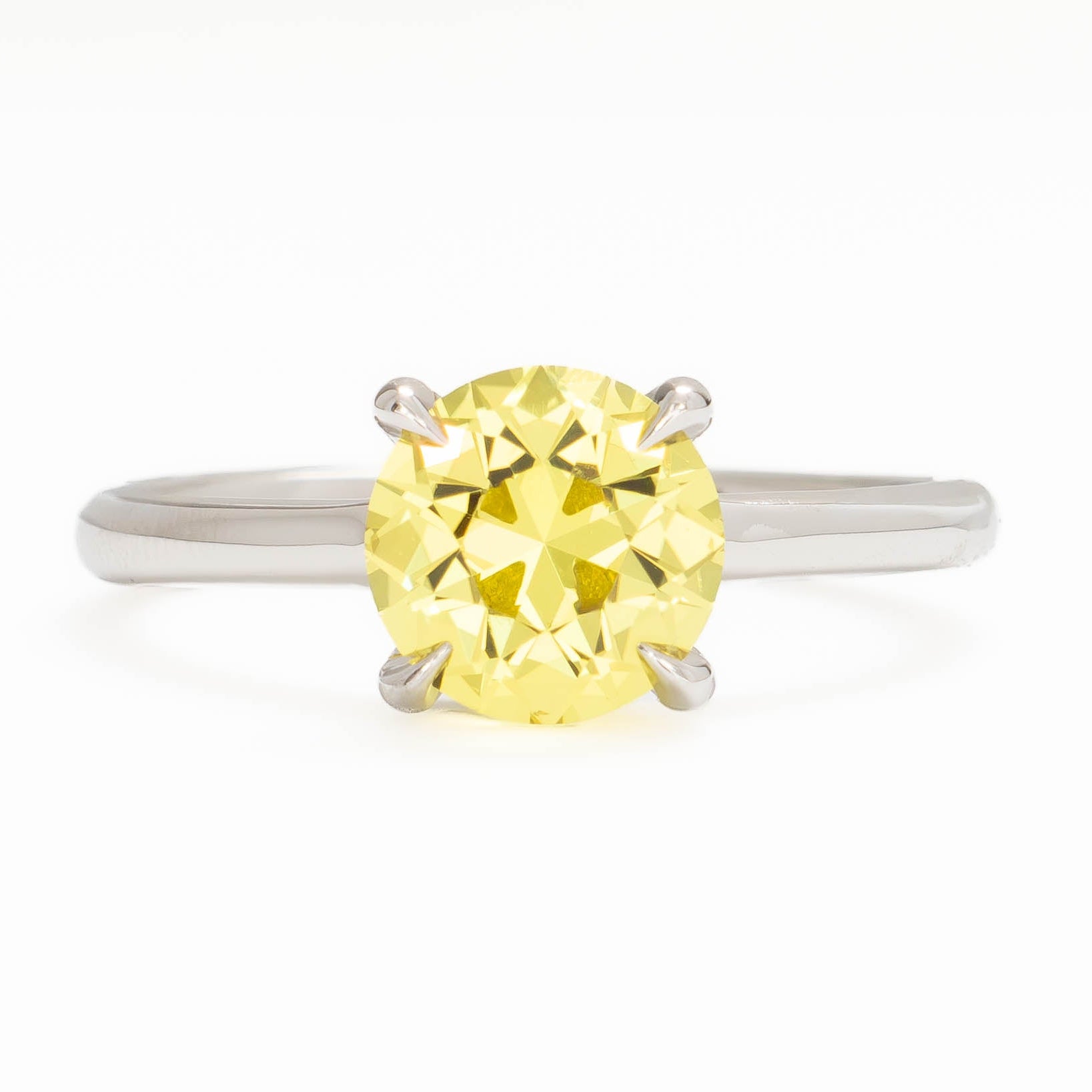 bree solitaire ring in white gold with round yellow lab sapphire