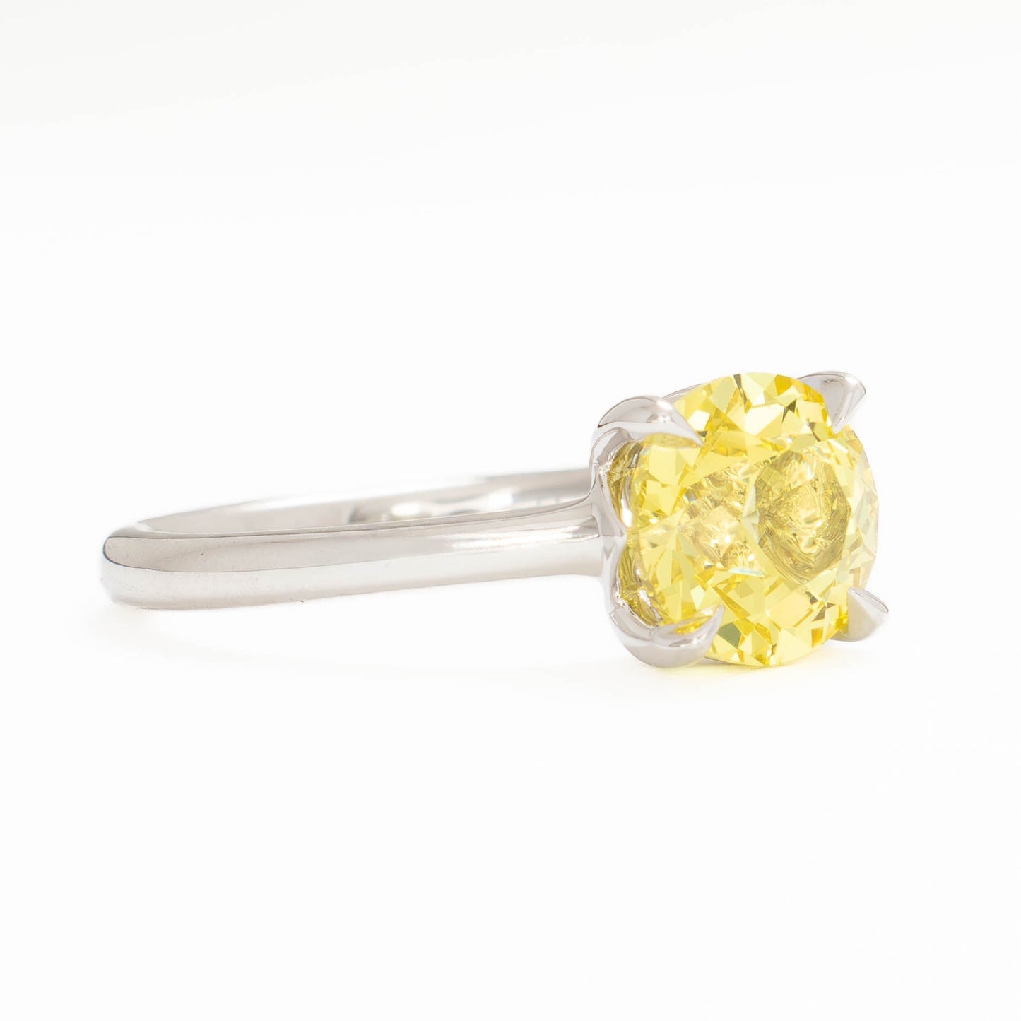 bree solitaire ring in white gold with round yellow lab sapphire