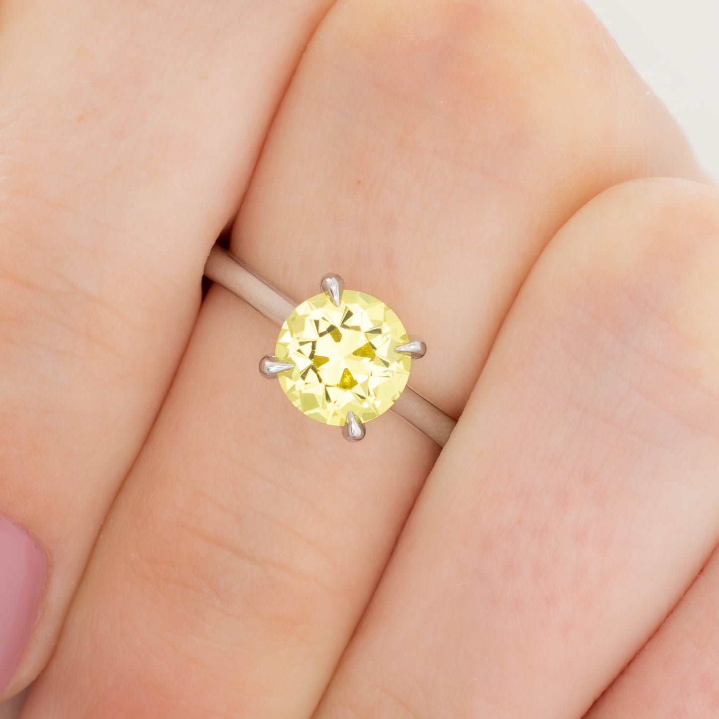 bree solitaire ring in white gold with round yellow lab sapphire