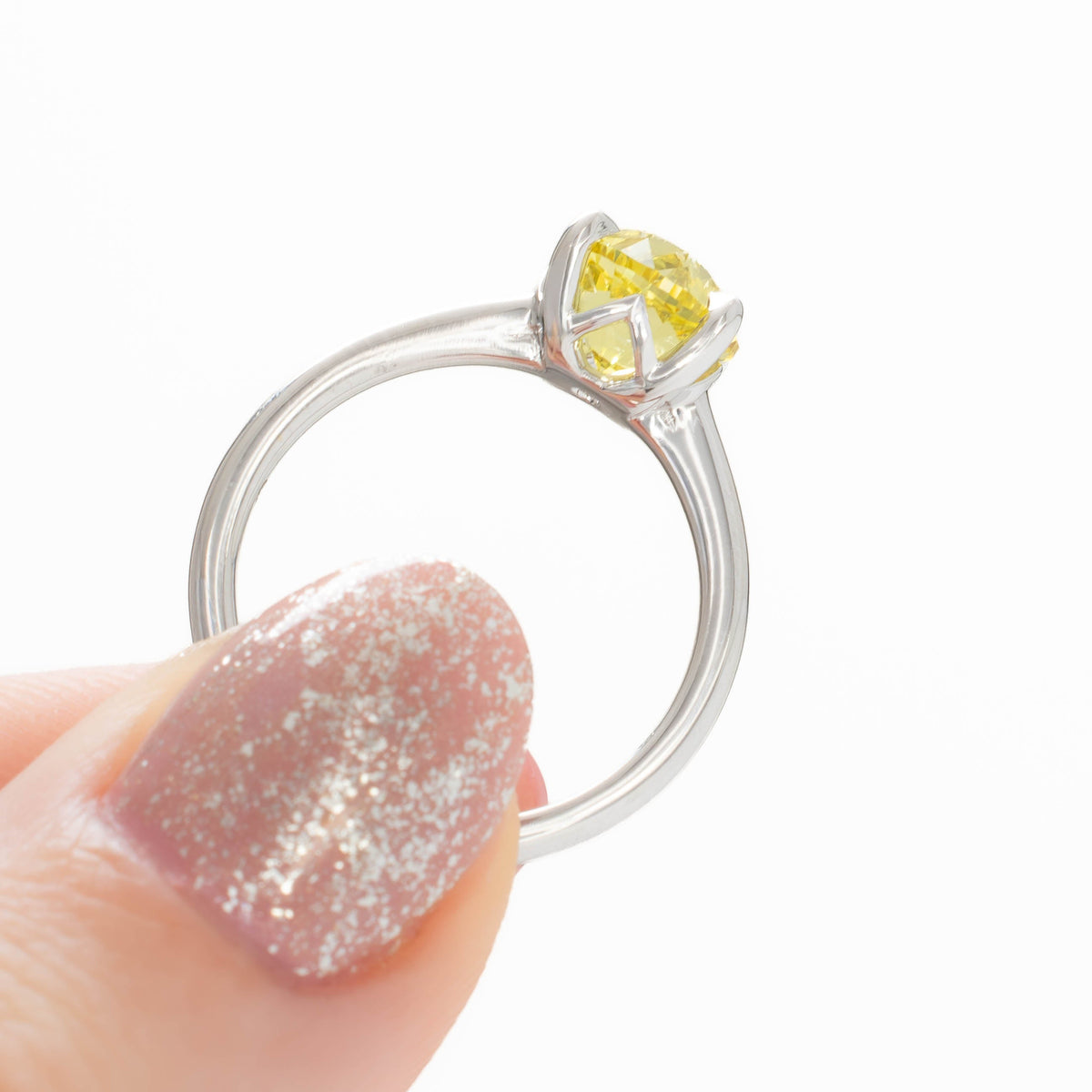 bree solitaire ring in white gold with round yellow lab sapphire
