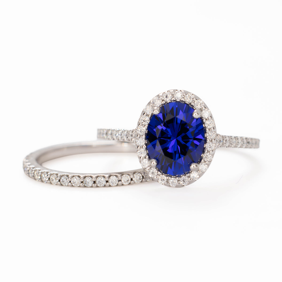 brynn halo ring in white gold with oval royal blue lab sapphire