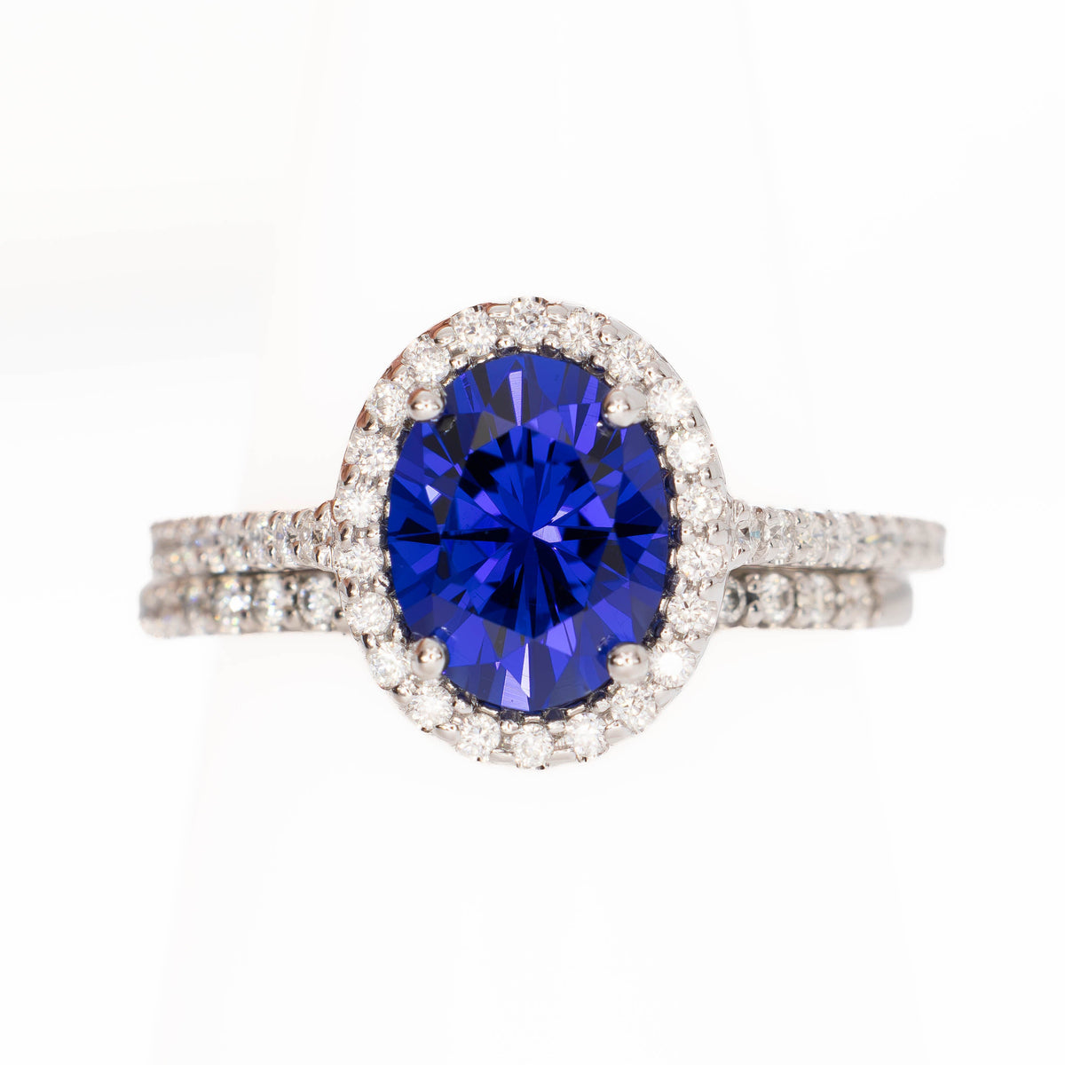 brynn halo ring in white gold with oval royal blue lab sapphire