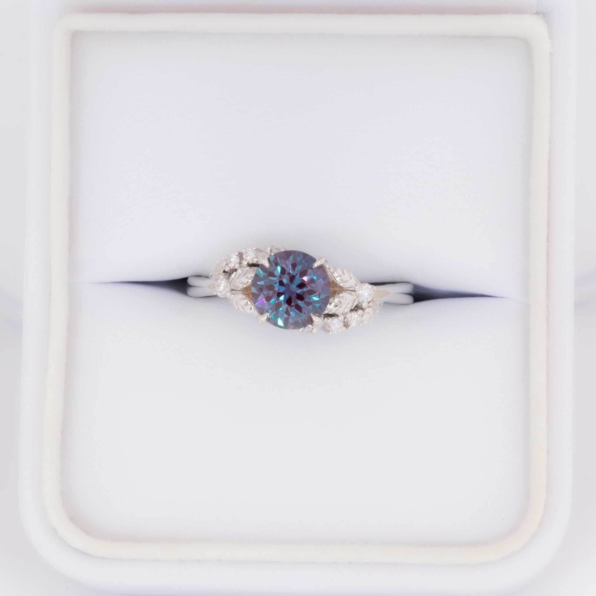 calida nature inspired engagement ring with round lab alexandrite