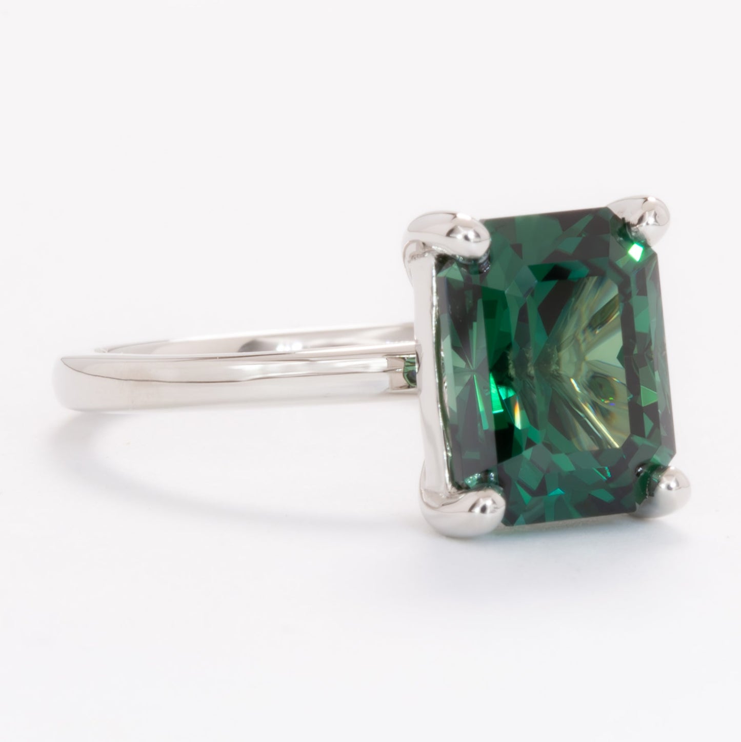 cali solitaire ring with radiant green lab sapphire