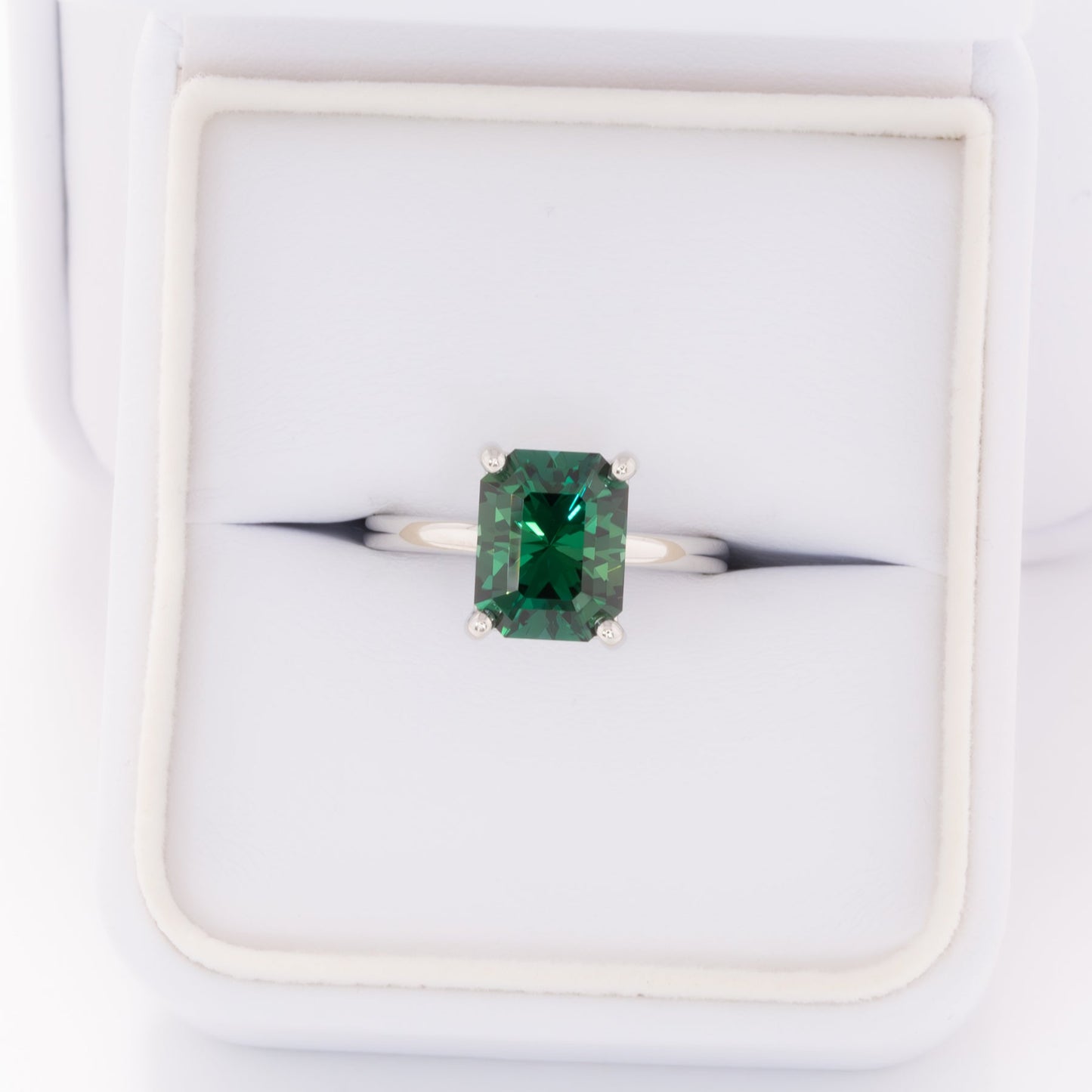 cali solitaire ring with radiant green lab sapphire