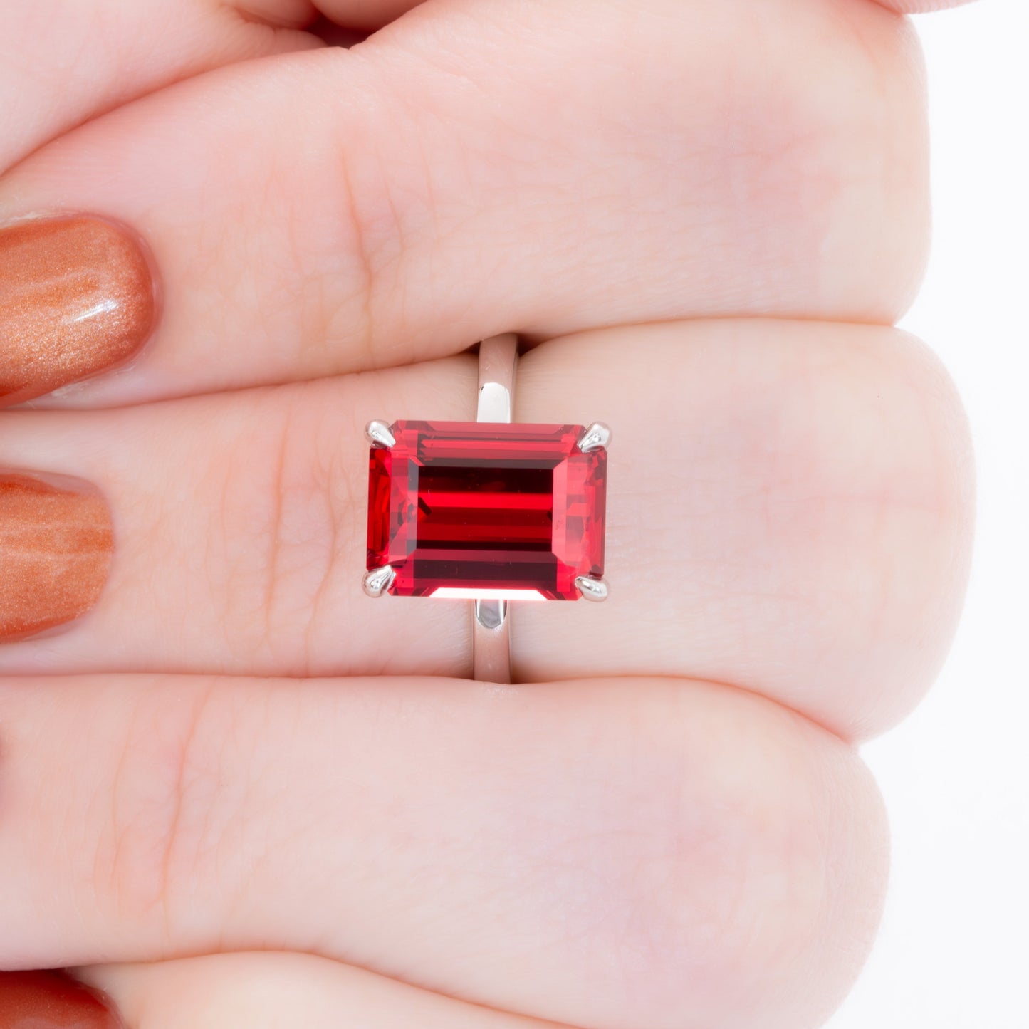 cali solitaire ring with step cut lab ruby