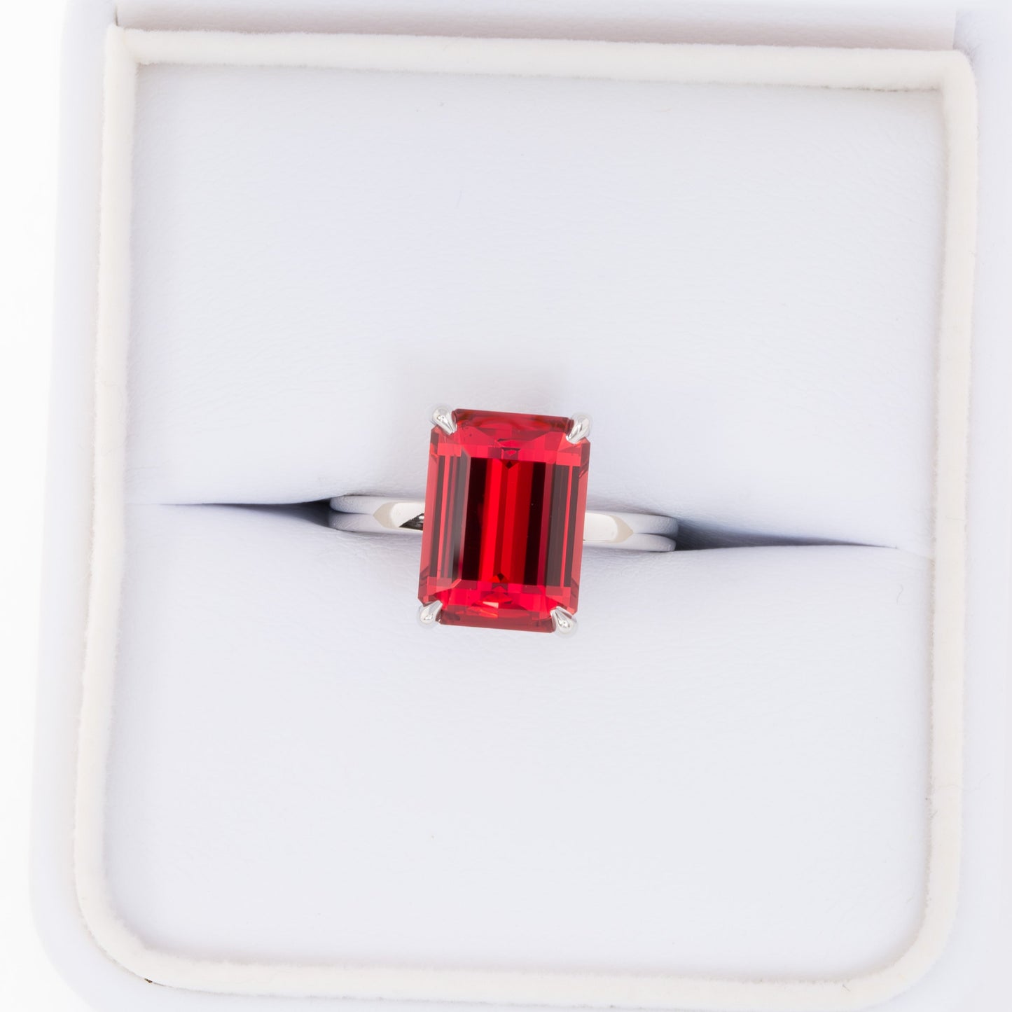 cali solitaire ring with step cut lab ruby