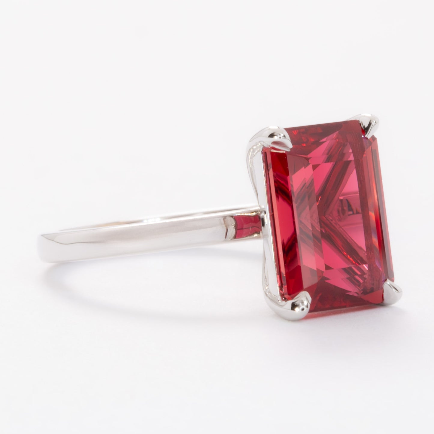 cali solitaire ring with step cut lab ruby
